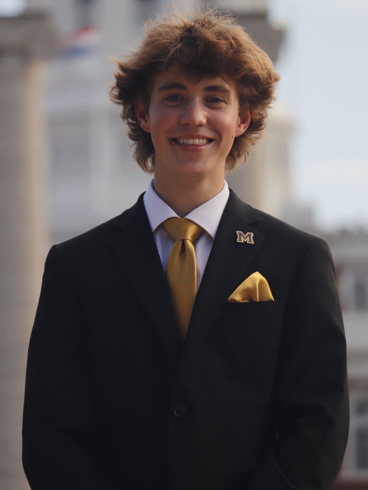 Portrait of Grady Wright, Co-Founder of Atlas Health Equity Group, smiling outdoors on the University of Missouri campus.